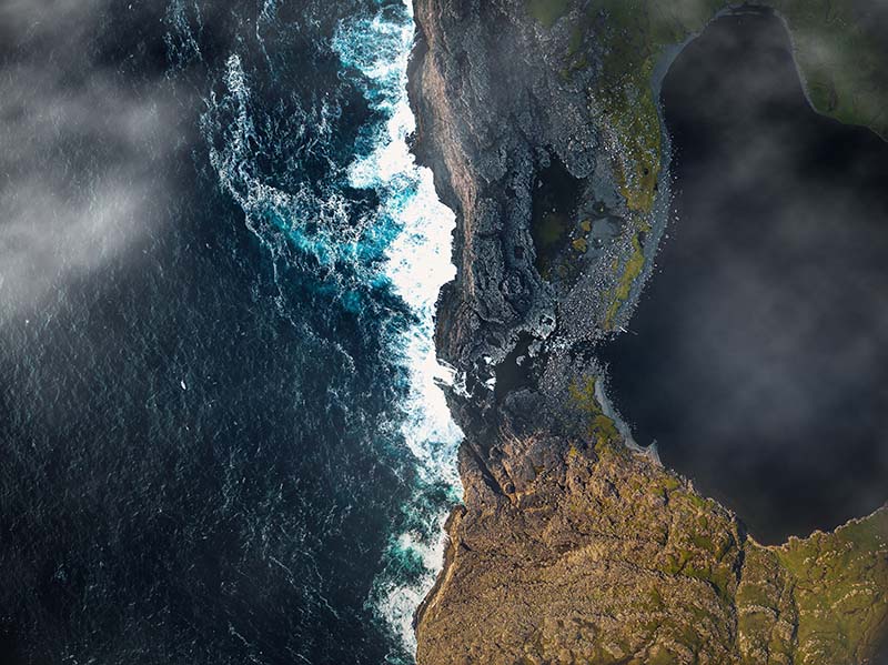 Waves crashing against a rocky shoreline